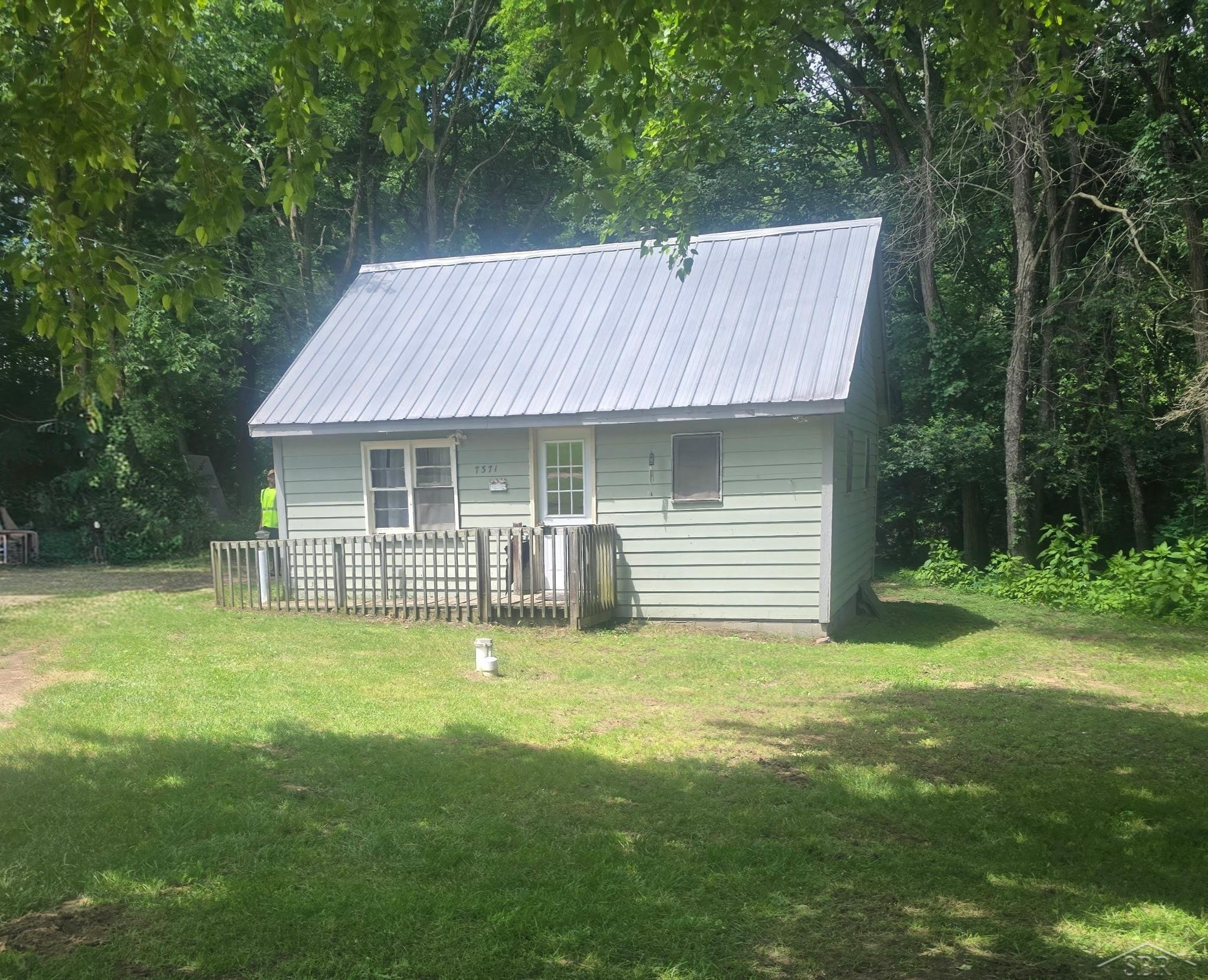 7371 Cedar lake Road, Edmore, MI 48829 — front exterior