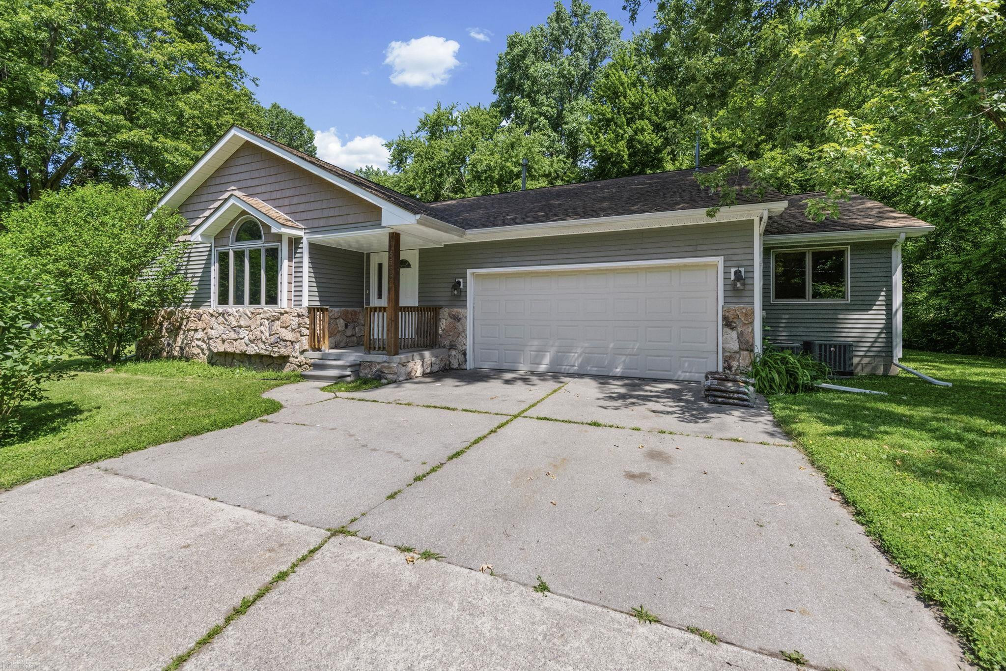 6580 Swartout Road, MI 48001 — front exterior
