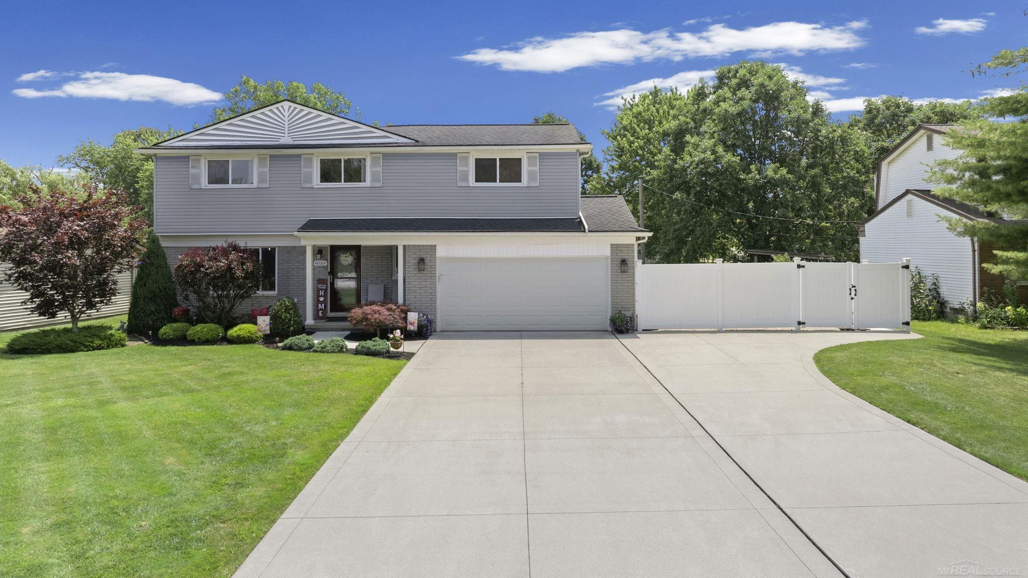 48064 Mallard Drive, MI 48047 — front exterior