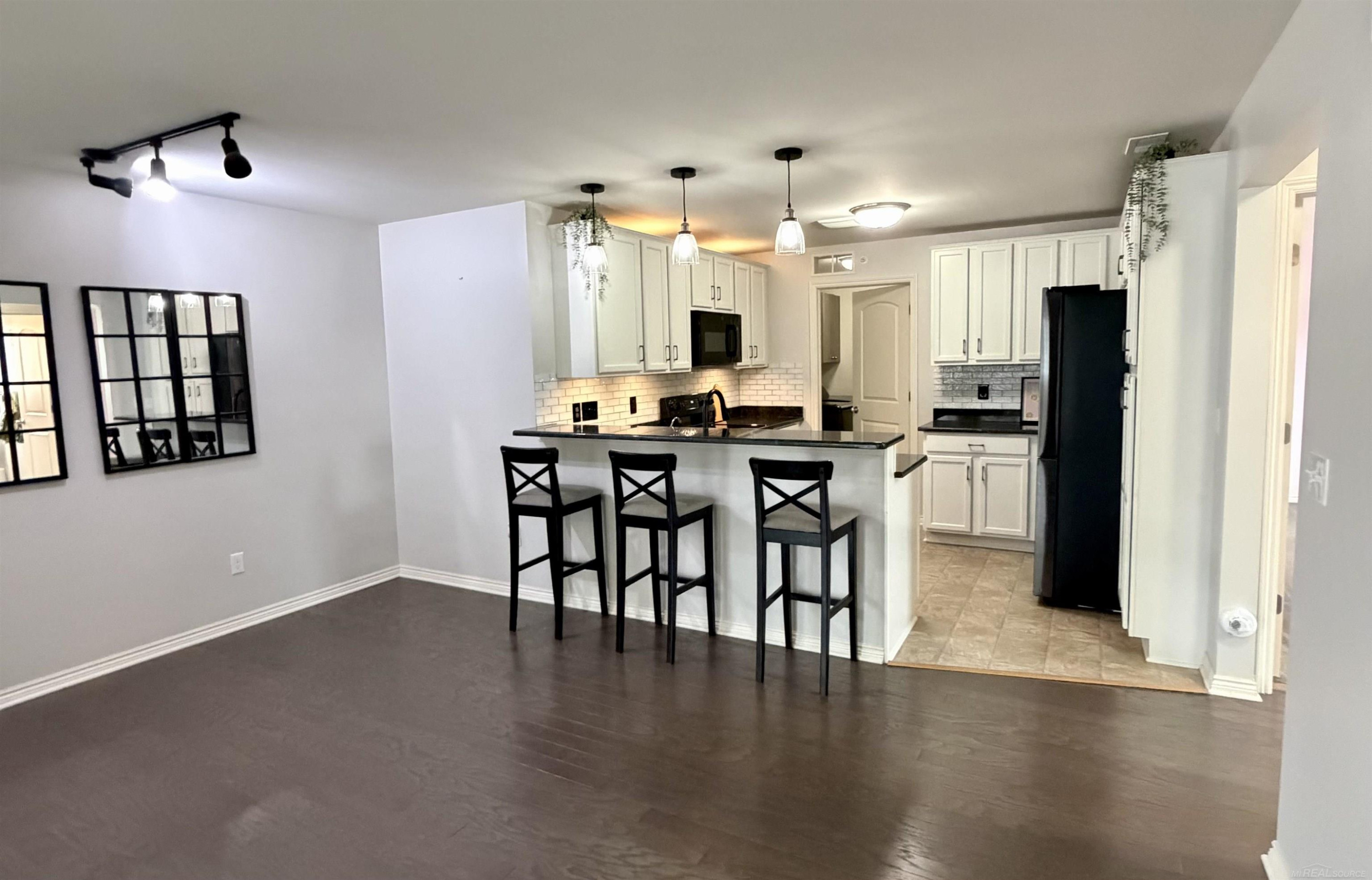 7013 Boulder Pointe Drive, Washington, MI — Photo 2