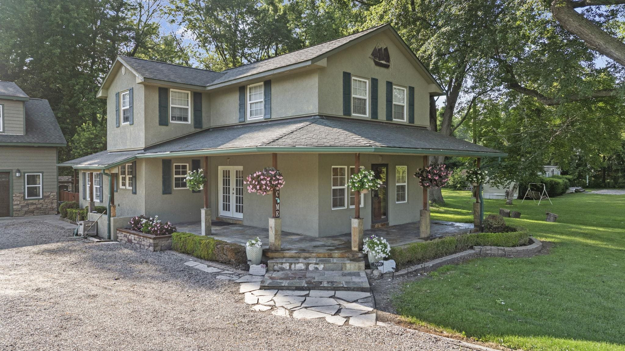 7990 Marsh Road, MI — front exterior