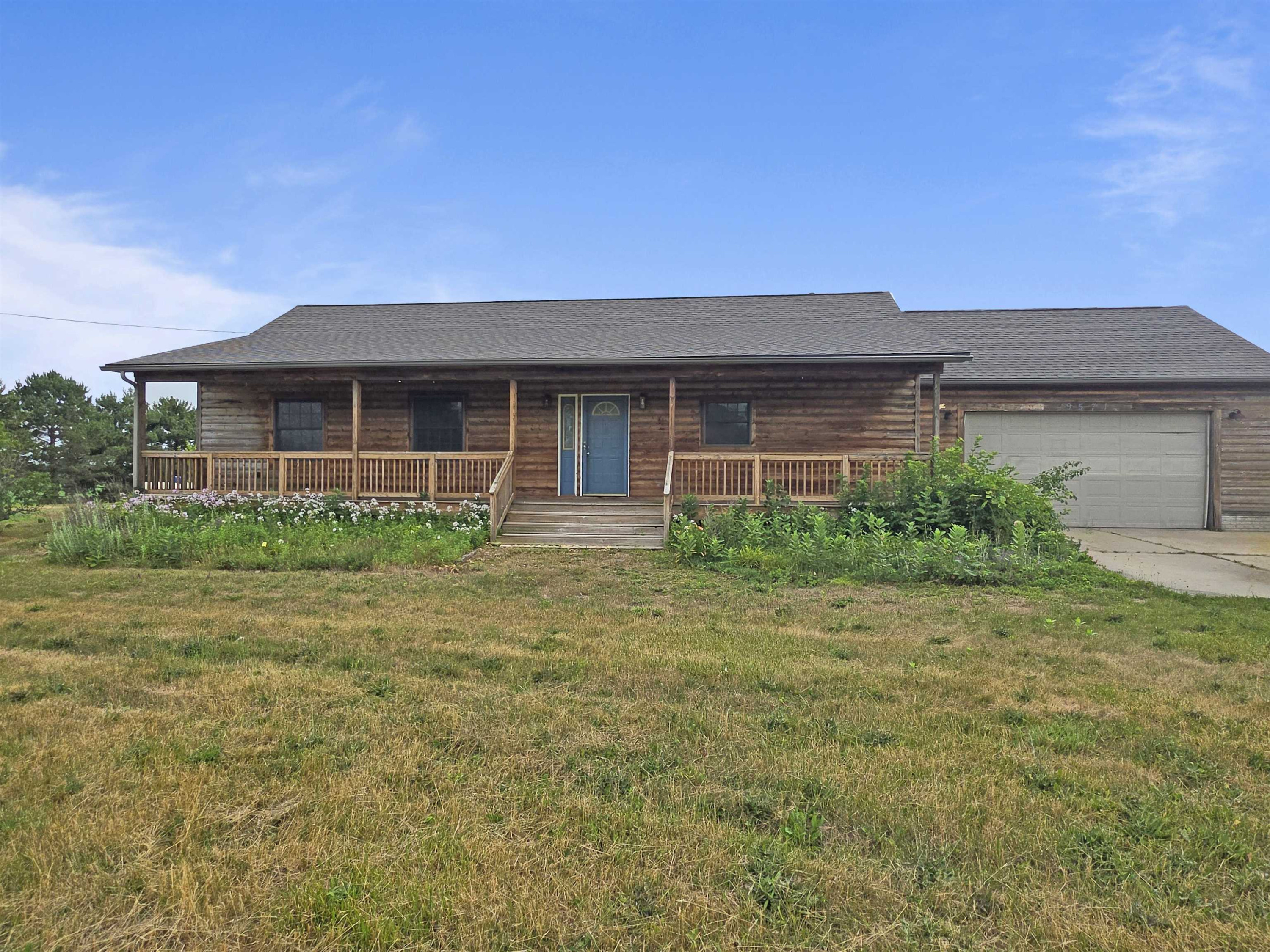 9571 Wilkinson Road, MI 48449 — front exterior