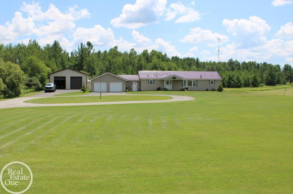67 W Kittle Road, Mio, MI 48647 — front exterior