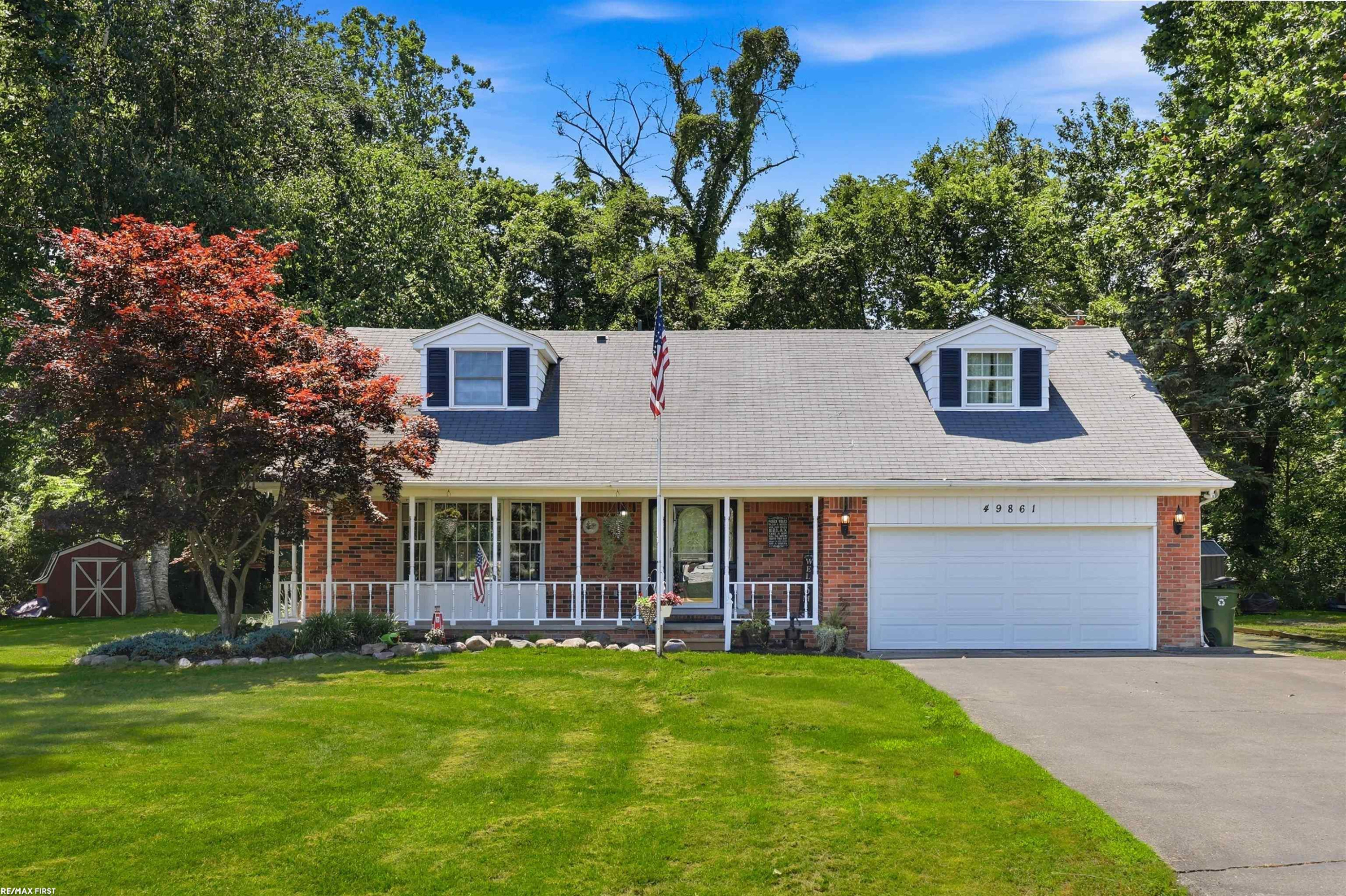 49861 Valley Drive, Shelby Twp, MI 48317 — front exterior