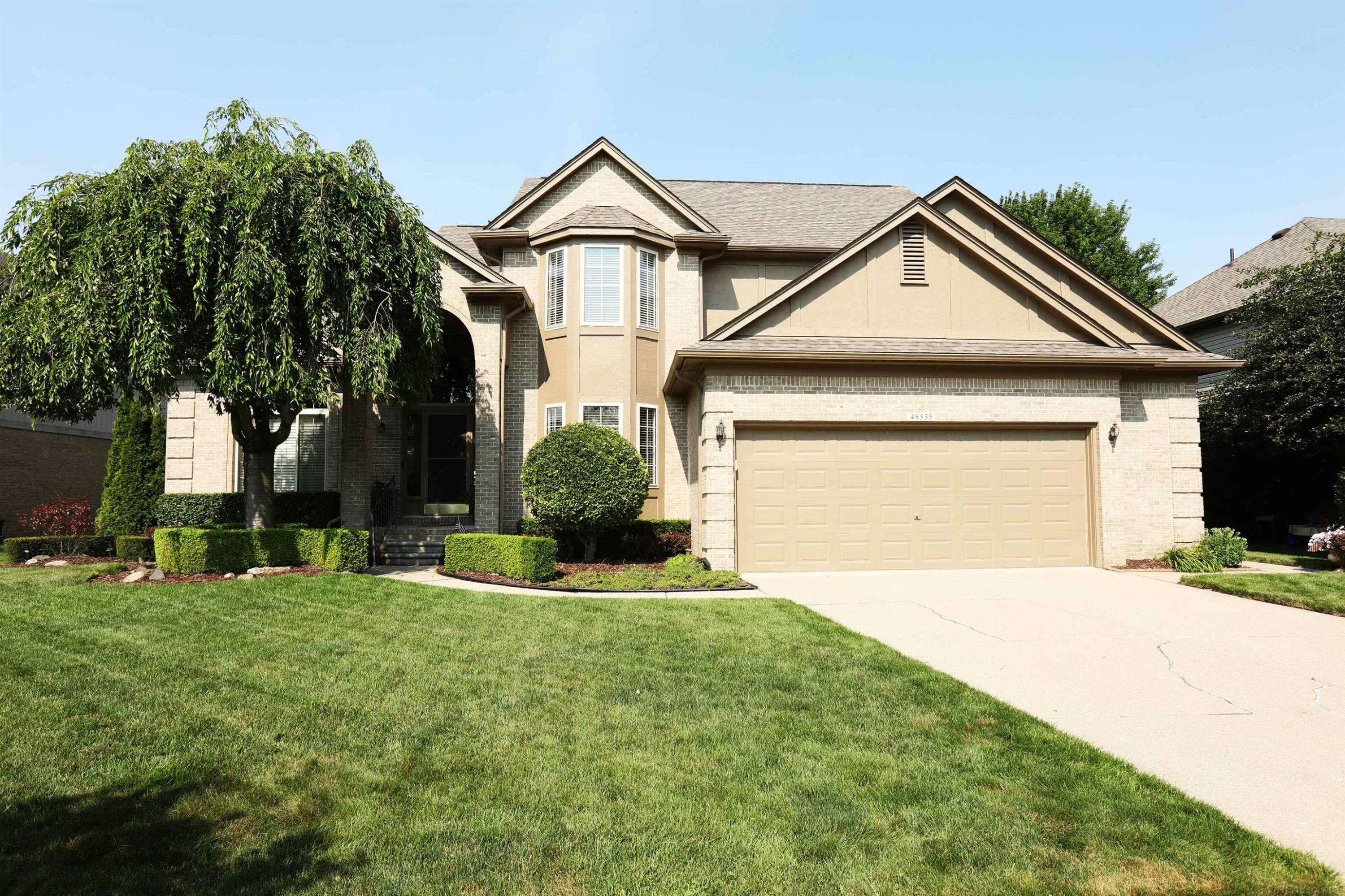 48535 Fairmont Drive, Macomb, MI 48044 — front exterior