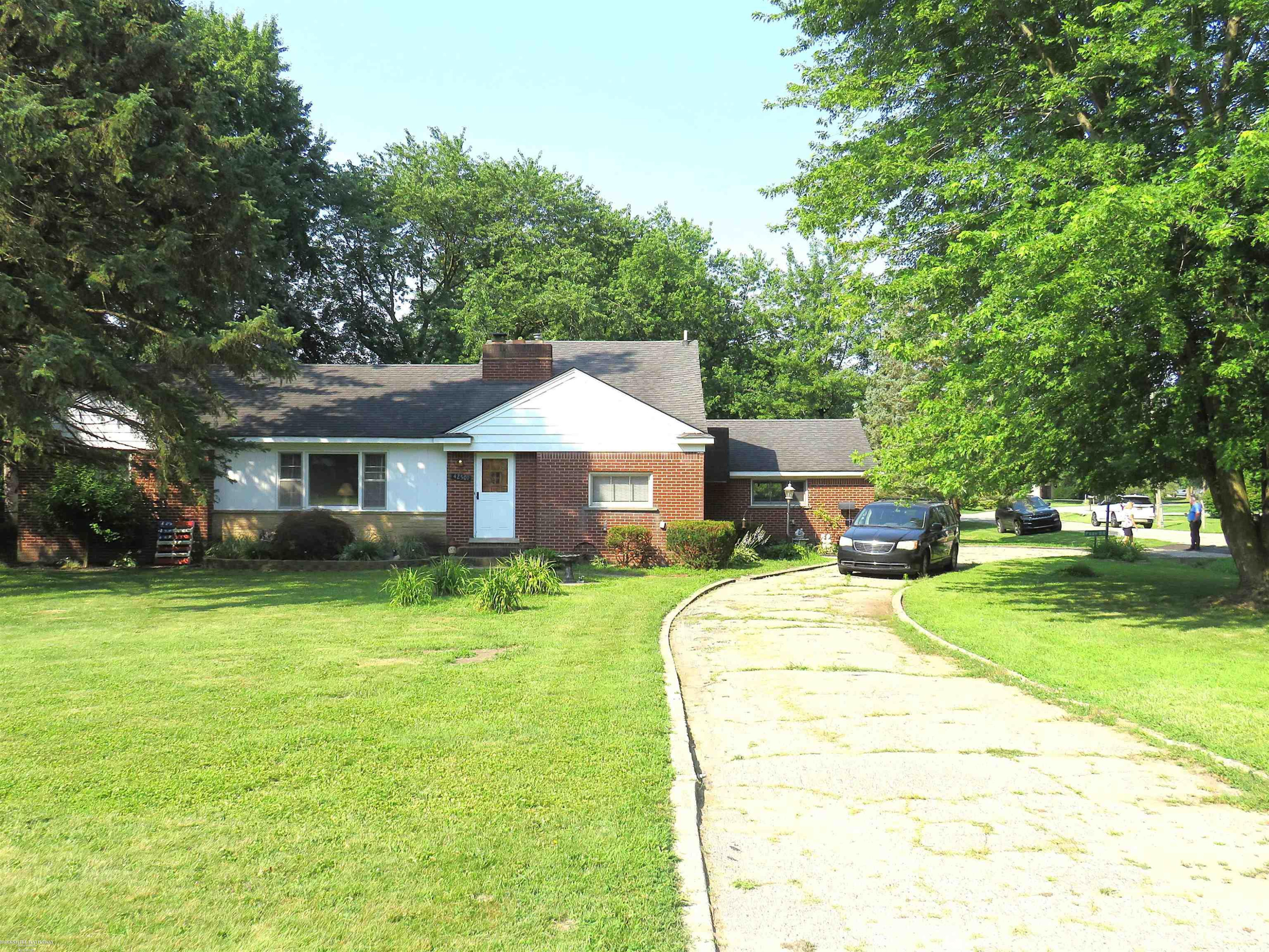 42501 Utica Road, Sterling Heights, MI 48314 — front exterior