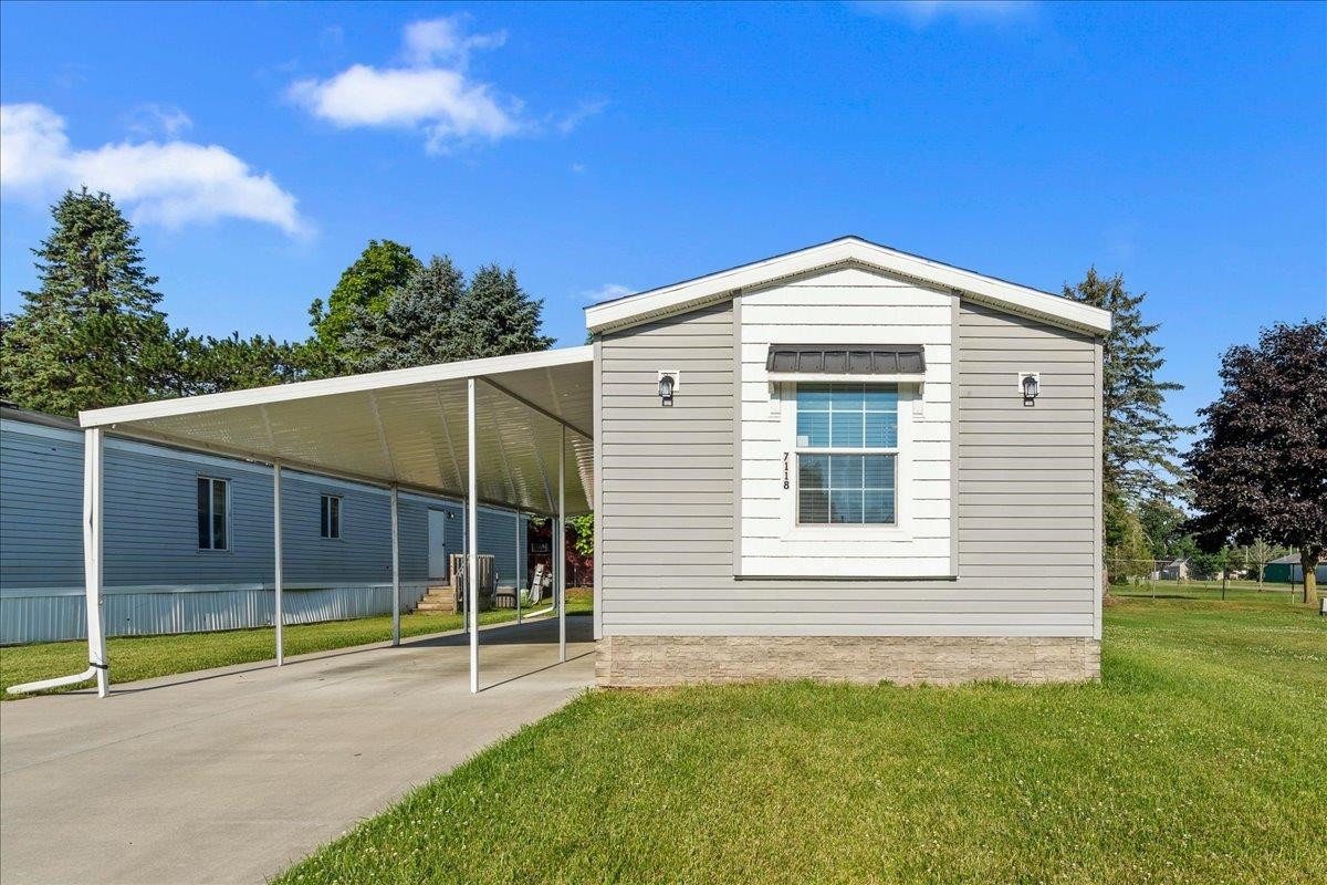 7118 W Mapleview Circle, MI 48416 — front exterior
