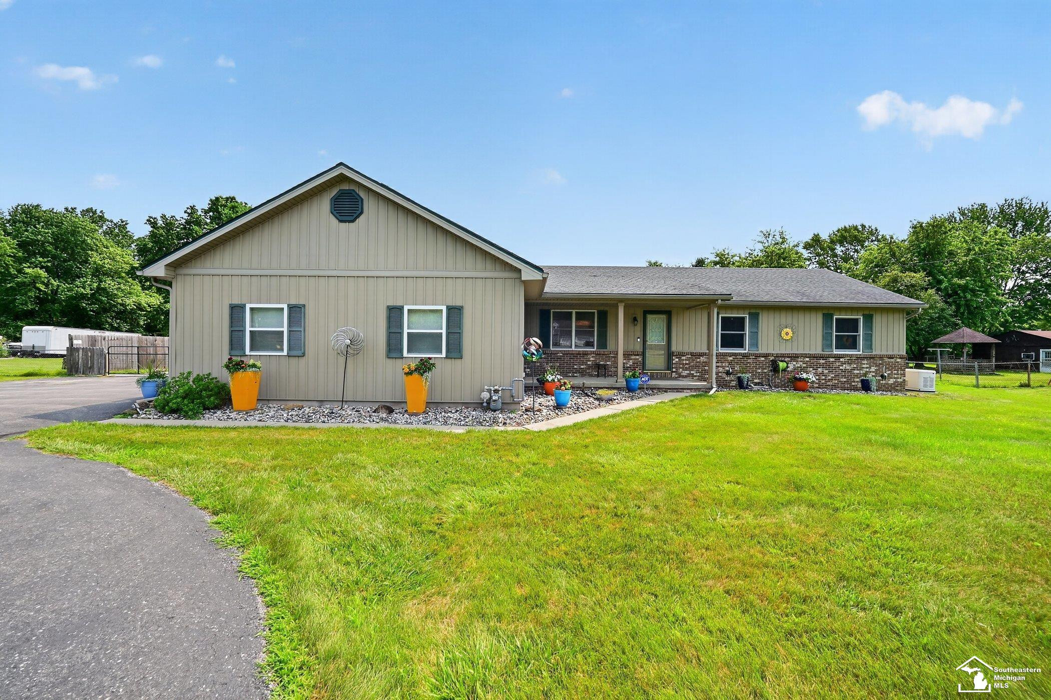 9858 Douglas Road, Temperance, MI — front exterior
