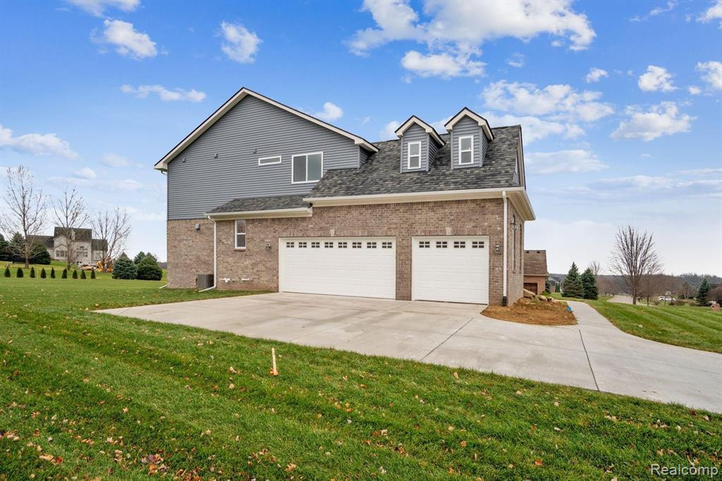 916 SADDLE CLUB Lane, Howell, MI 48843 — Photo 2