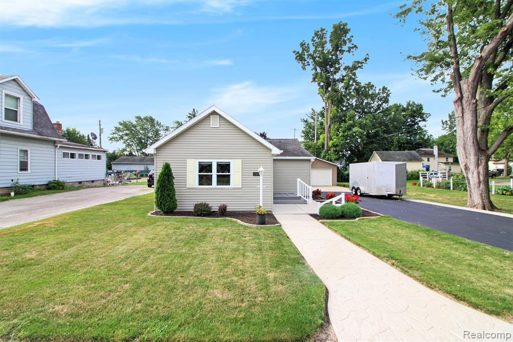 220 E GRAND RIVER Road, Webberville, MI 48892 — front exterior
