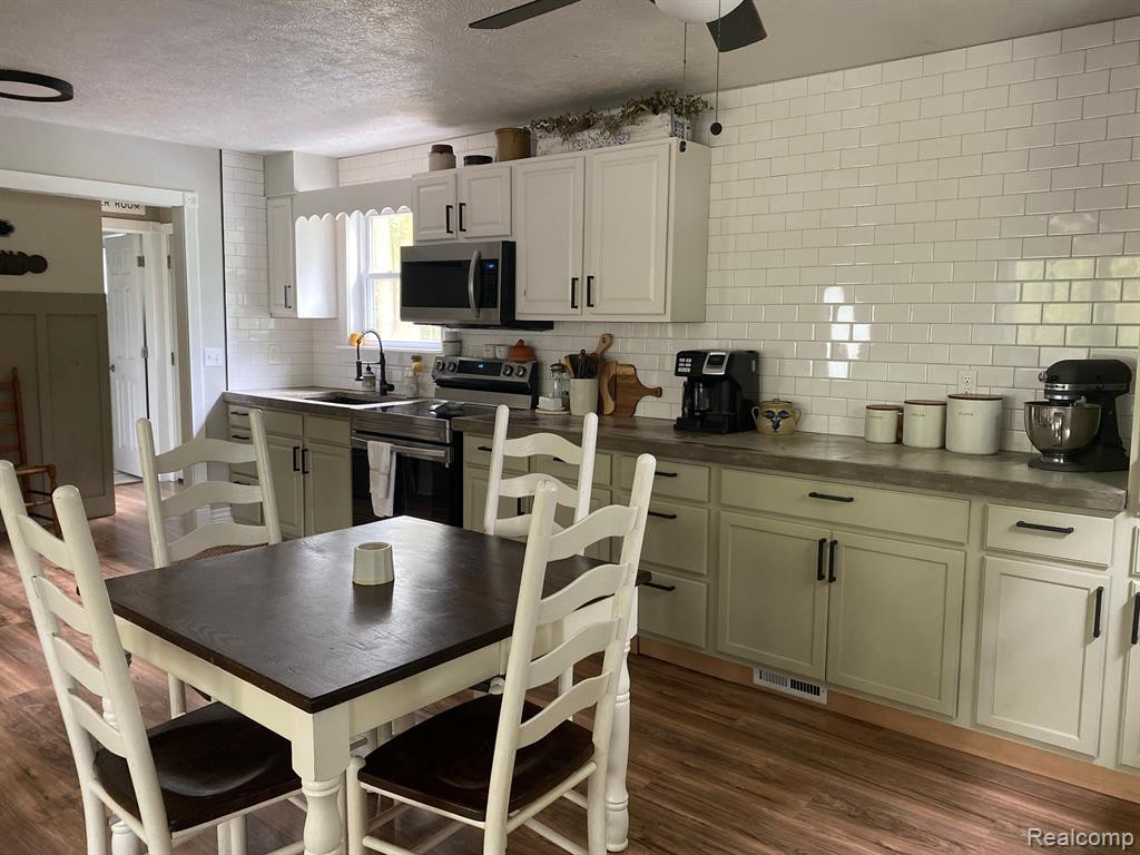 511 E TYRRELL Road, Morrice, MI 48857 — Photo 14