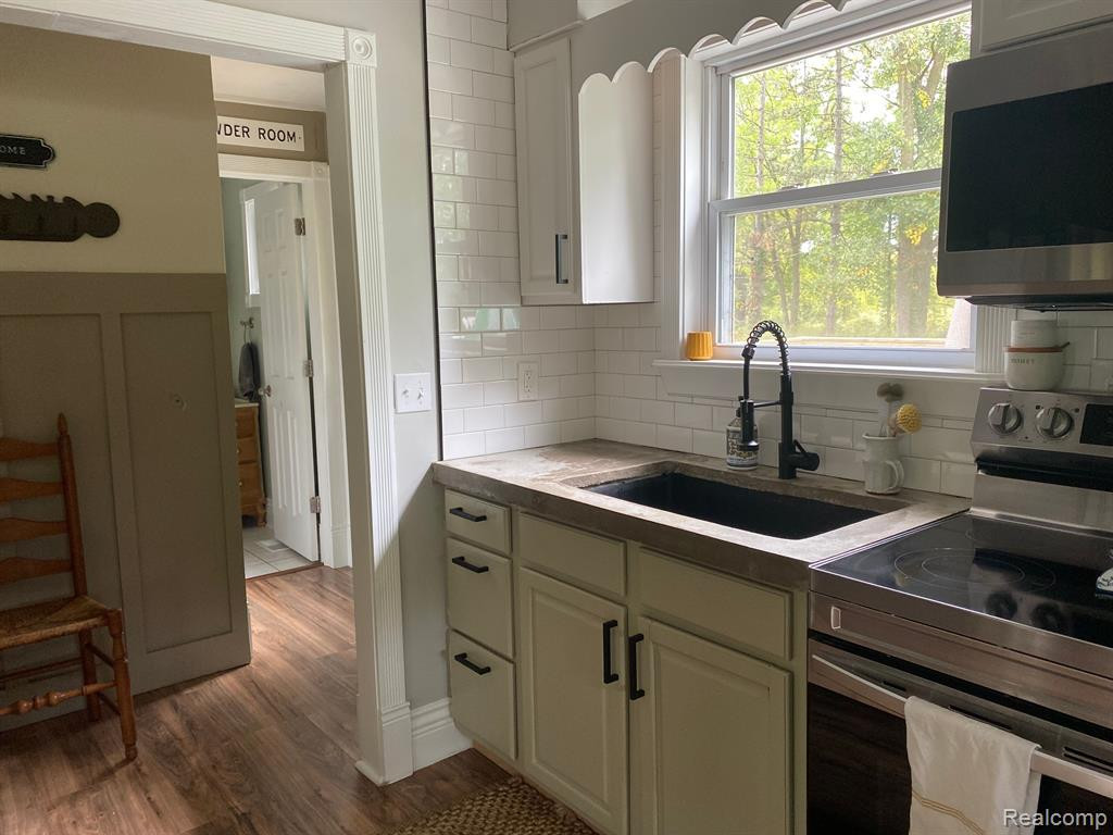 511 E TYRRELL Road, Morrice, MI 48857 — Photo 16