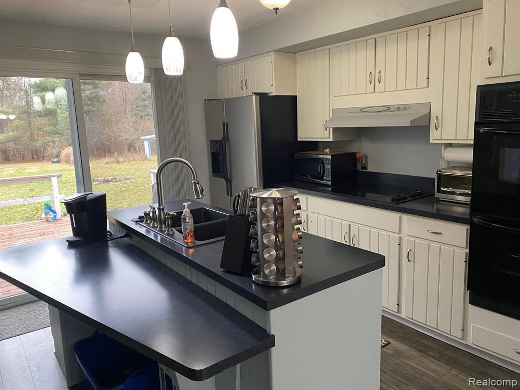 2810 W MAPLE Road, Wixom, MI 48393 — Photo 6