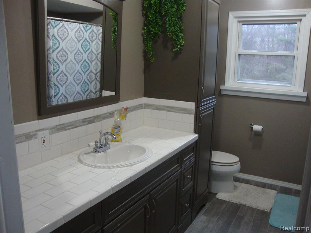 2810 W MAPLE Road, Wixom, MI 48393 — Photo 26