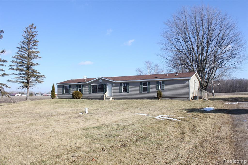 18247 EAST Road, New Lothrop, MI 48460 — front exterior