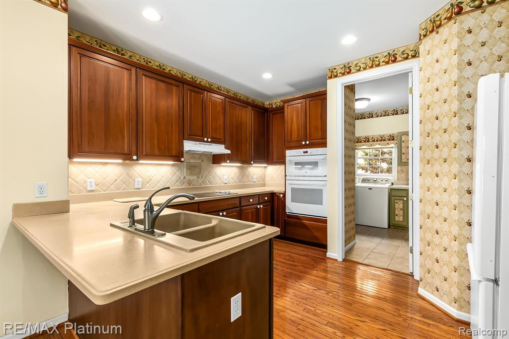 7575 WOODWIND, Brighton, MI 48116 — Photo 16
