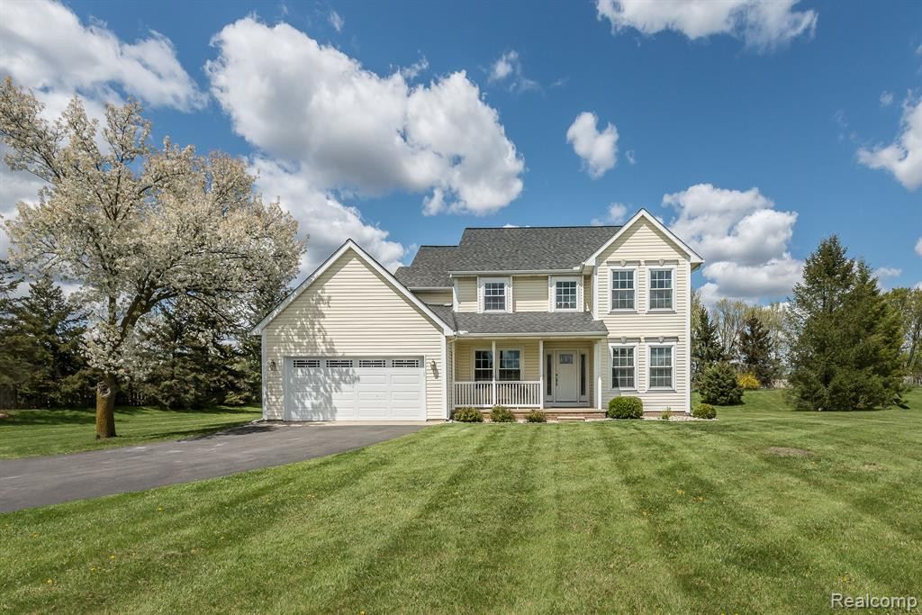 6900 RALARIC Drive, Dexter, MI 48130 — front exterior