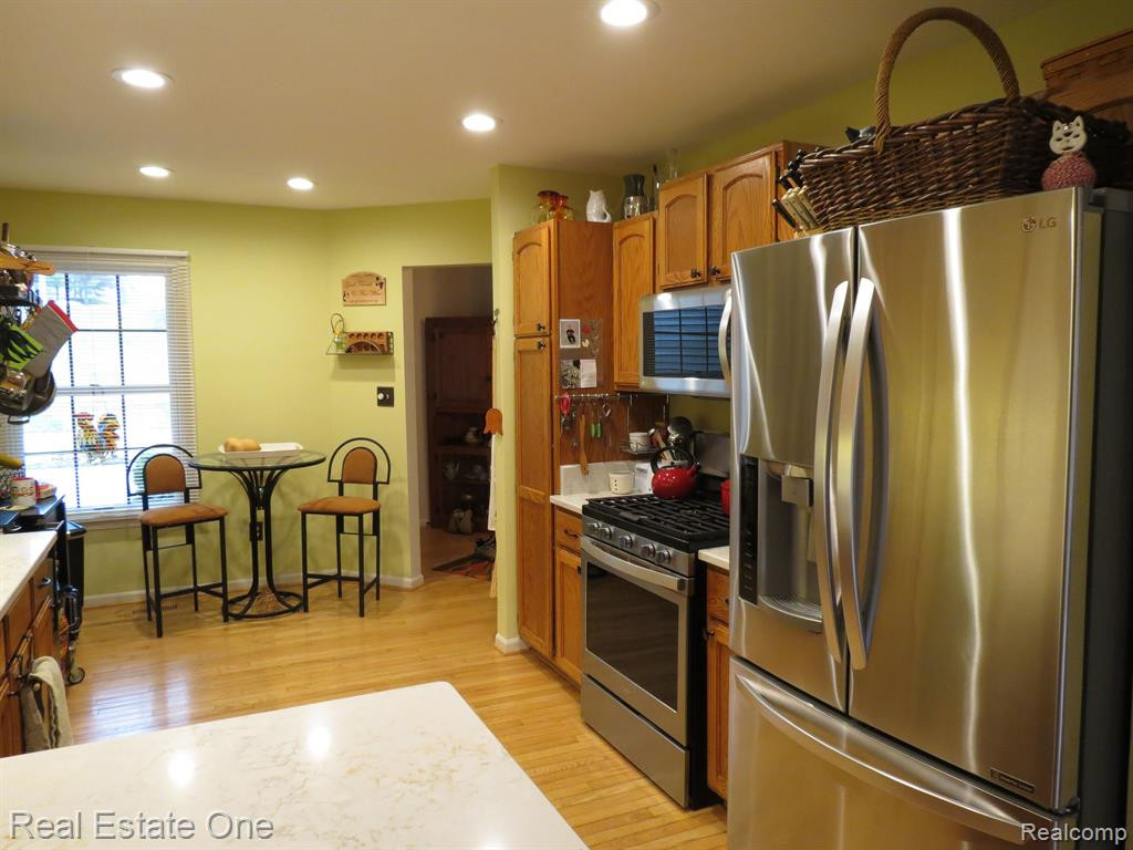 940 WOODRIDGE HILLS Drive, Brighton, MI 48116 — Photo 5