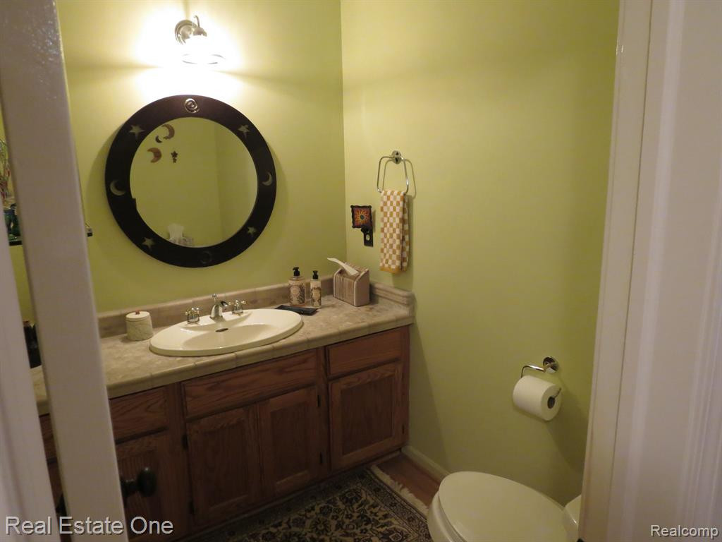 940 WOODRIDGE HILLS Drive, Brighton, MI 48116 — Photo 10