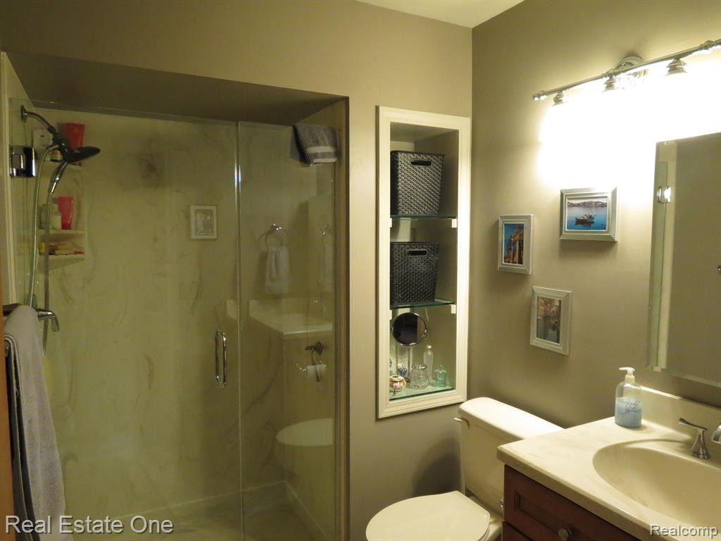 940 WOODRIDGE HILLS Drive, Brighton, MI 48116 — Photo 15