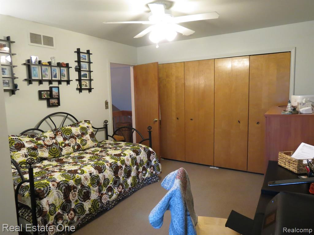 940 WOODRIDGE HILLS Drive, Brighton, MI 48116 — Photo 20