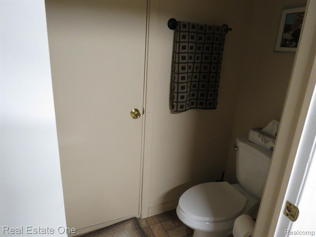 940 WOODRIDGE HILLS Drive, Brighton, MI 48116 — Photo 26