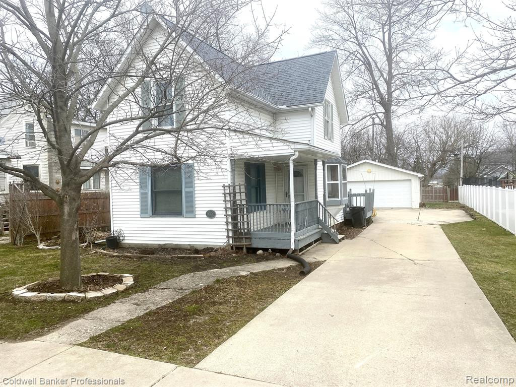 208 N WALKER Street, Capac, MI 48014 — front exterior