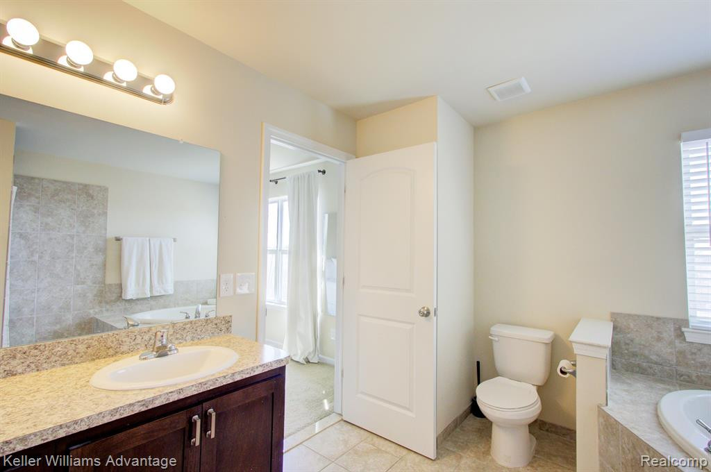 24597 ROSEMONT Unit #59 Drive, South Lyon, MI 48178 — Photo 22