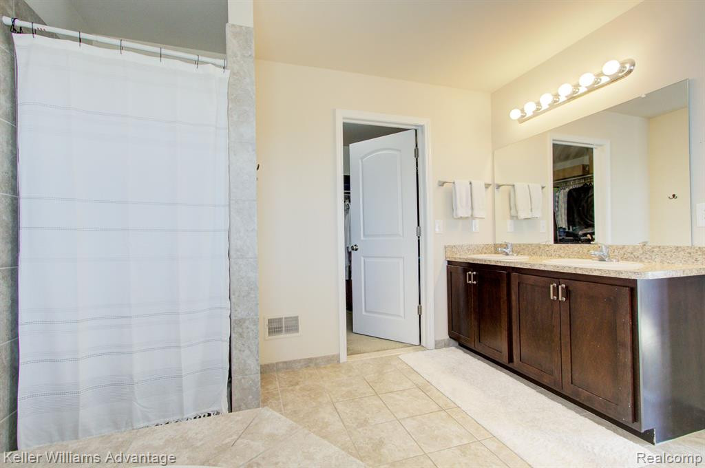 24597 ROSEMONT Unit #59 Drive, South Lyon, MI 48178 — Photo 24