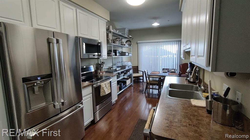1703 RIVERSEDGE Drive, 67, Saline, MI 48176 — Photo 2