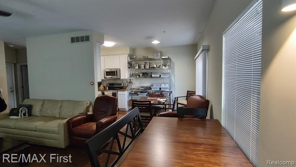 1703 RIVERSEDGE Drive, 67, Saline, MI 48176 — Photo 4