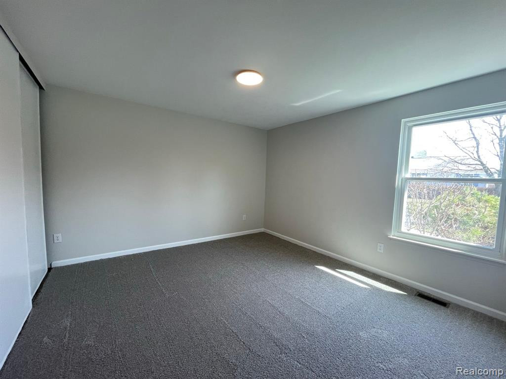 242 NEPTUNE Drive, Walled Lake, MI 48390 — Photo 11