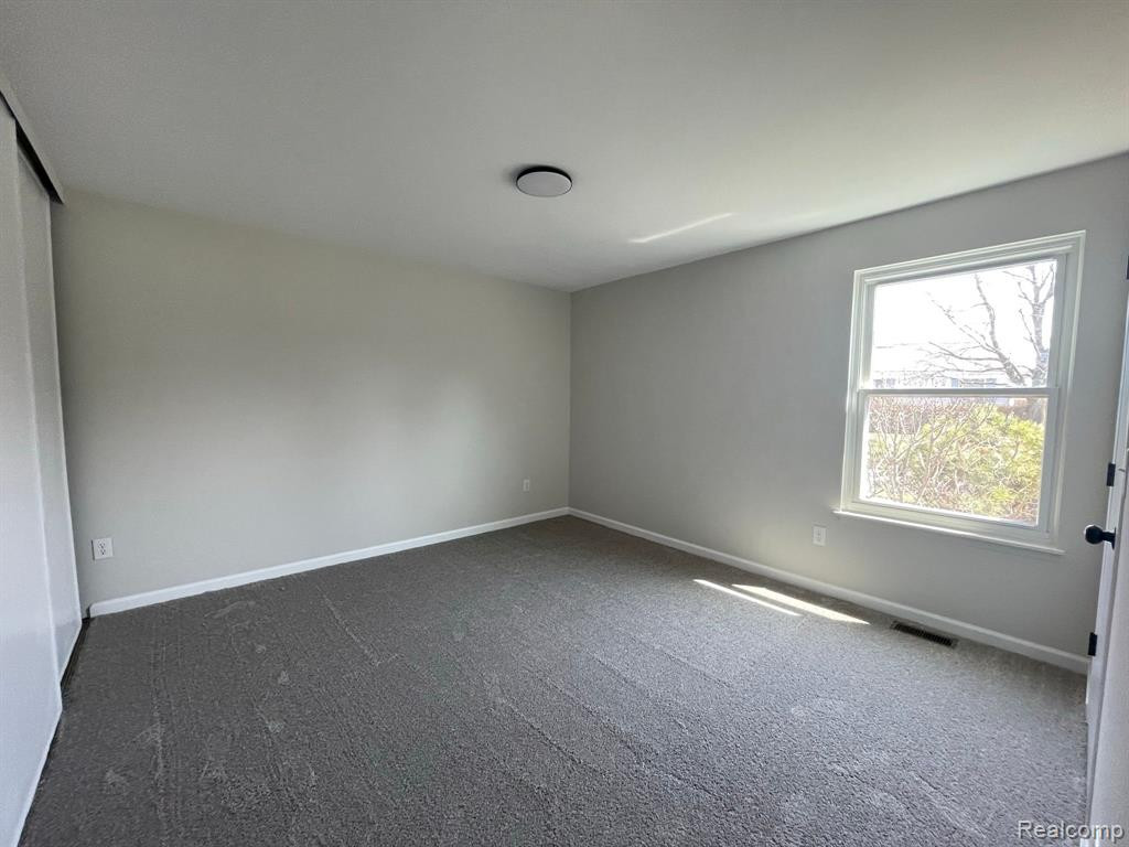 242 NEPTUNE Drive, Walled Lake, MI 48390 — Photo 15
