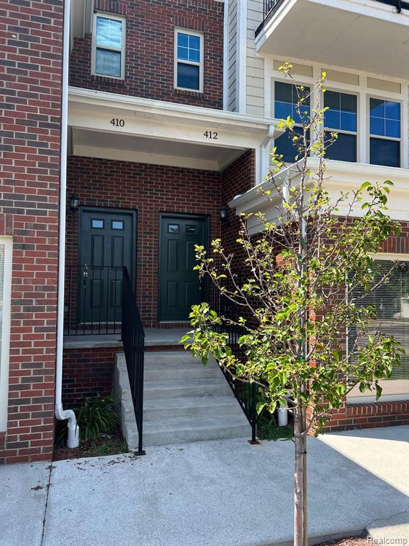 412 LEGATO Drive, Walled Lake, MI 48390 — front exterior