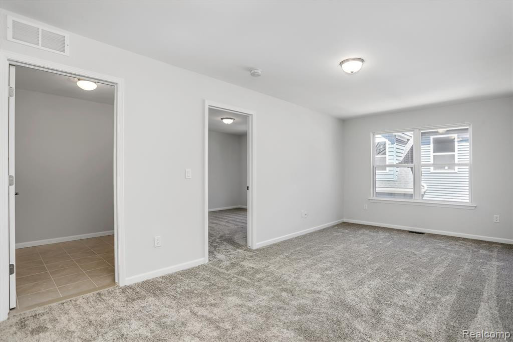 214 SINGH Boulevard, South Lyon, MI 48178 — Photo 24