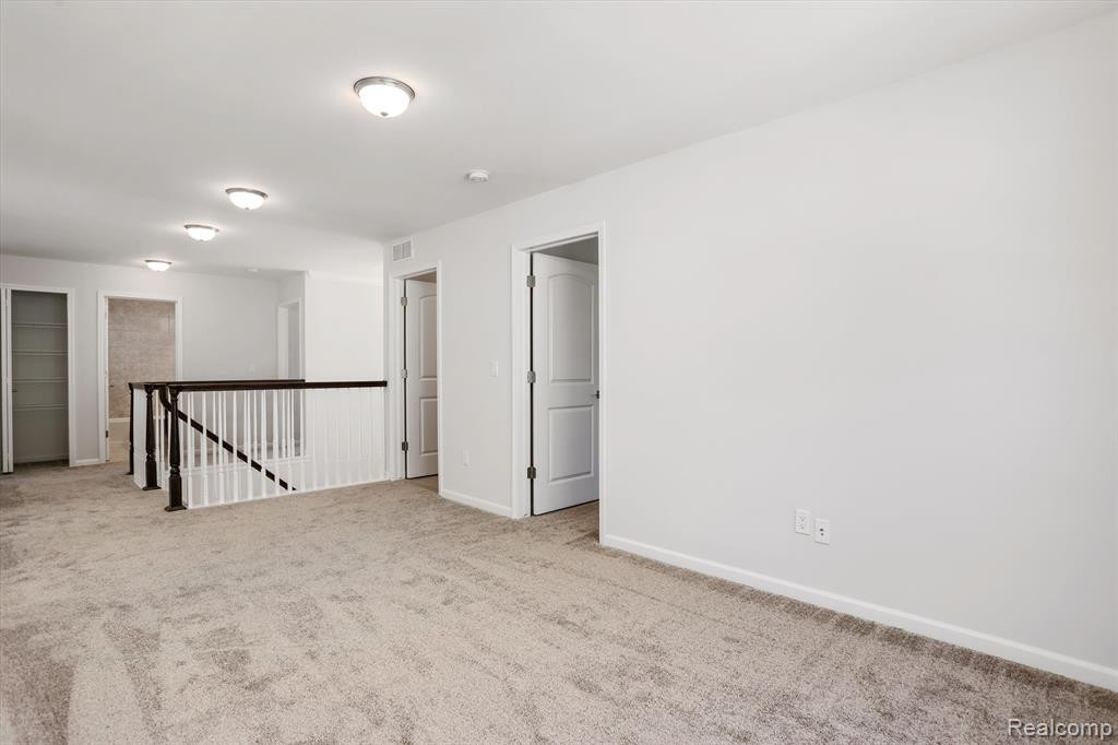 214 SINGH Boulevard, South Lyon, MI 48178 — Photo 25