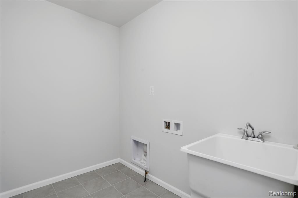 214 SINGH Boulevard, South Lyon, MI 48178 — Photo 26