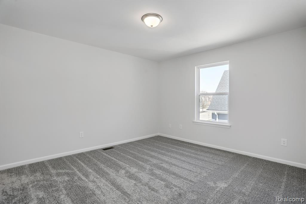 214 SINGH Boulevard, South Lyon, MI 48178 — Photo 27