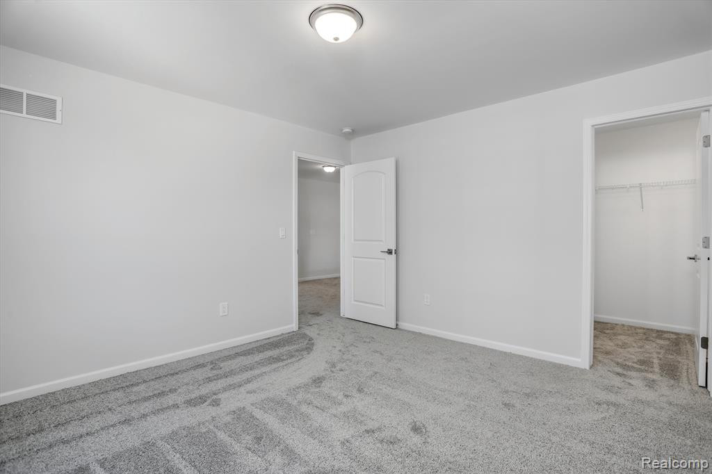 214 SINGH Boulevard, South Lyon, MI 48178 — Photo 28