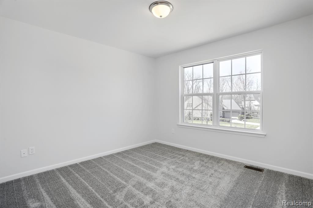 214 SINGH Boulevard, South Lyon, MI 48178 — Photo 29