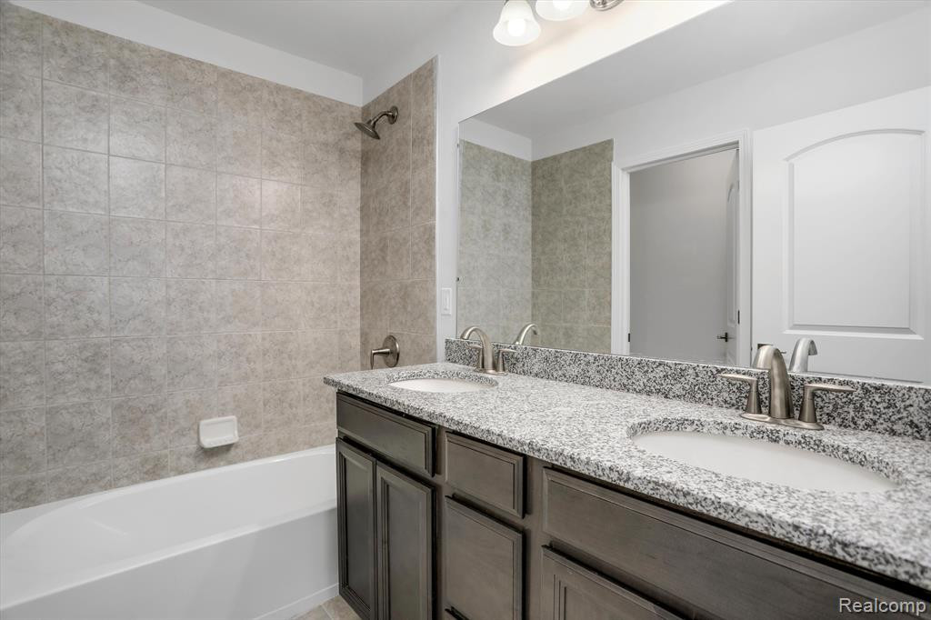 214 SINGH Boulevard, South Lyon, MI 48178 — Photo 31