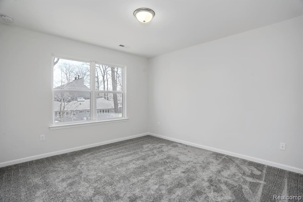 214 SINGH Boulevard, South Lyon, MI 48178 — Photo 32