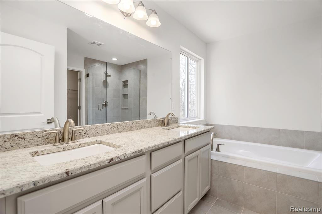 214 SINGH Boulevard, South Lyon, MI 48178 — Photo 36