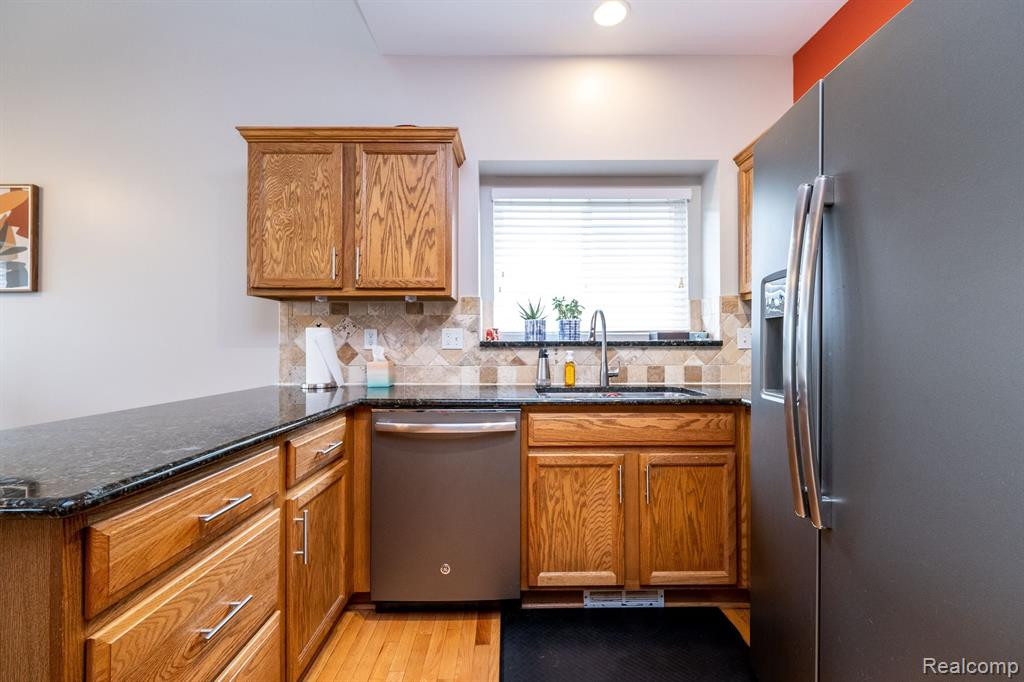 1022 PADDOCK Drive, 4, South Lyon, MI 48178 — Photo 16