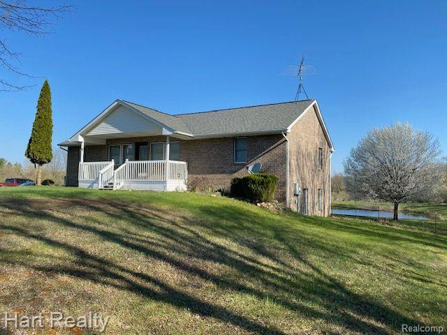 165 E BARNES Road, Fostoria, MI 48435 — front exterior