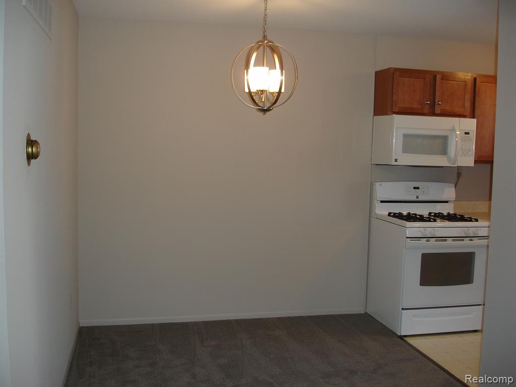 144 Lake Village Drive, APT 6, Walled Lake, MI 48390 — Photo 9