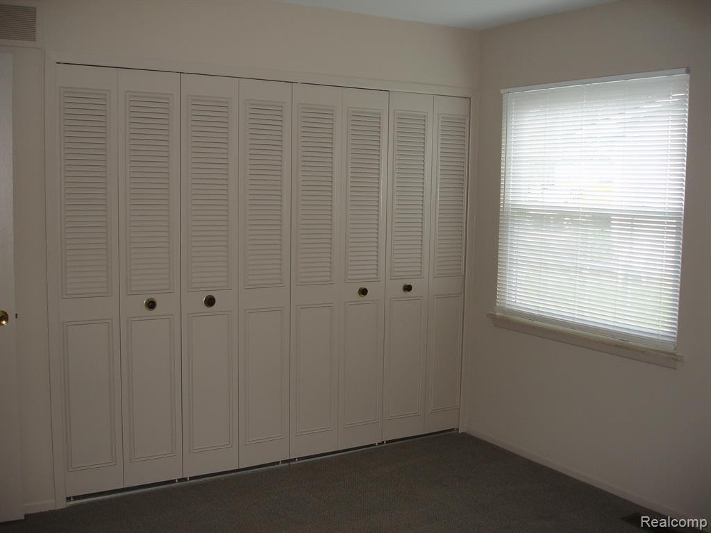 144 Lake Village Drive, APT 6, Walled Lake, MI 48390 — Photo 15
