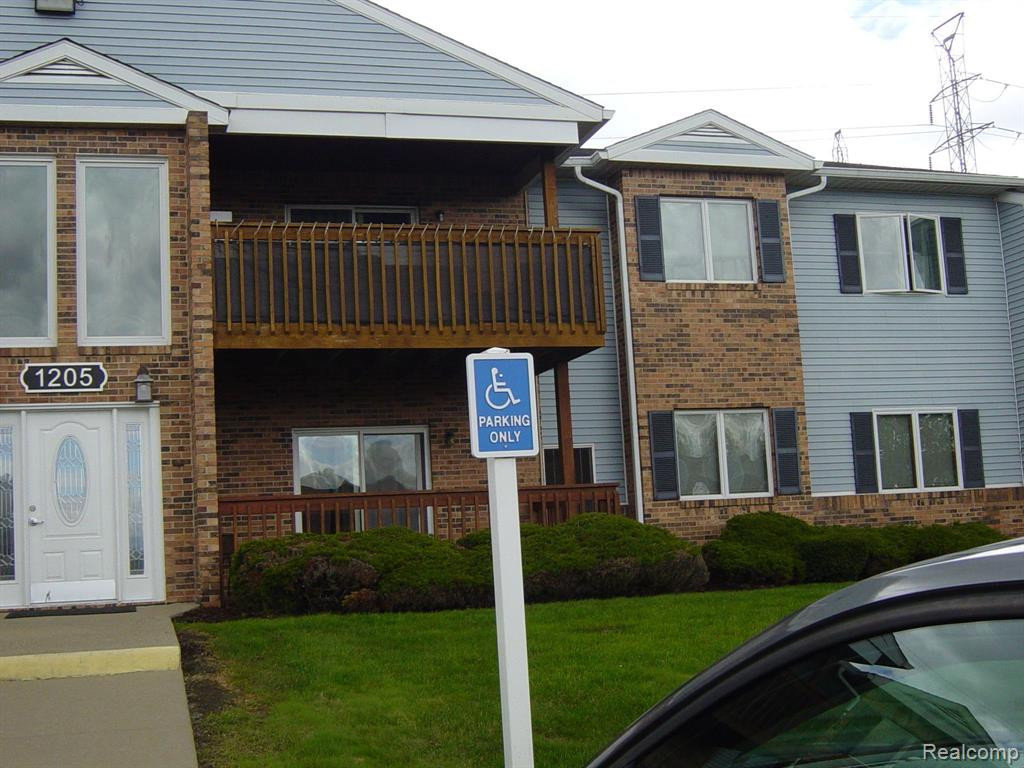 1205 HARBOUR Drive, 34, Trenton, MI 48183 — front exterior