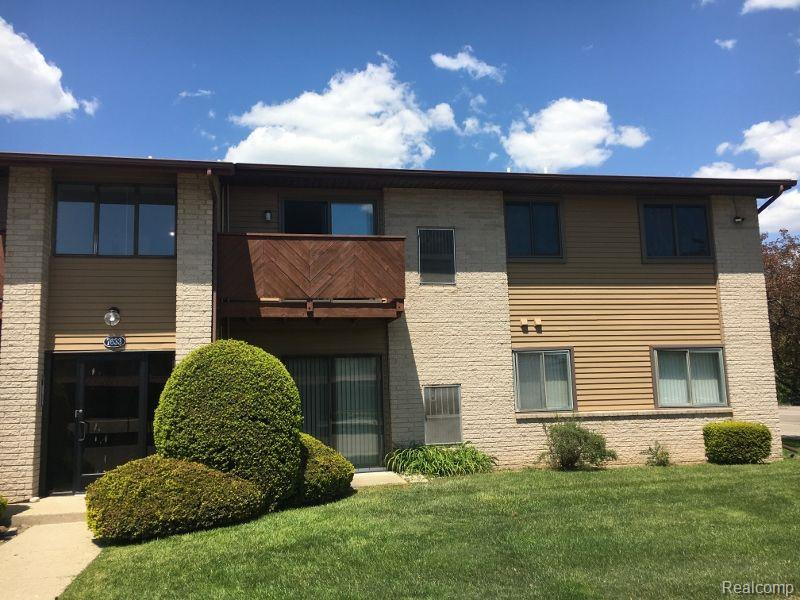 7633 MANOR Circle, 202, Westland, MI — front exterior