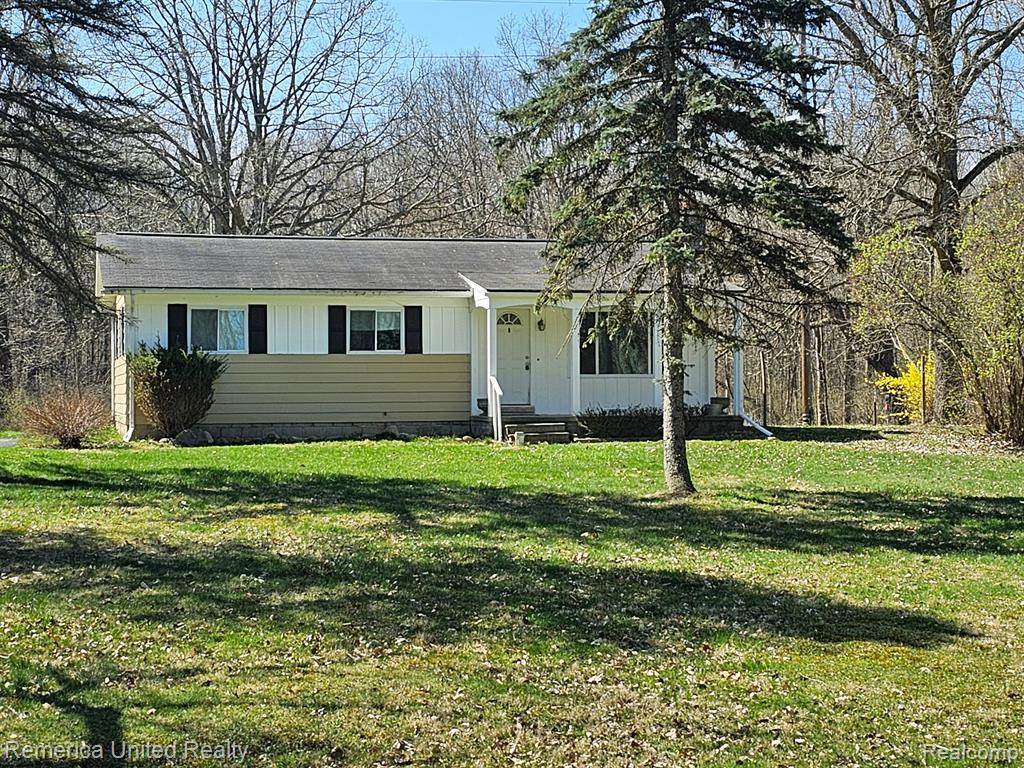 5220 IOSCO Road, Webberville, MI 48892 — front exterior